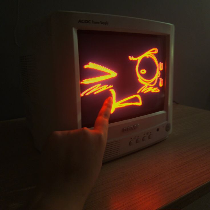 a very cute computer getting booped on the cheek